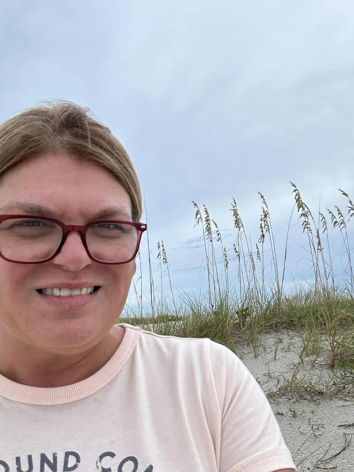 Amanda smiling outdoors